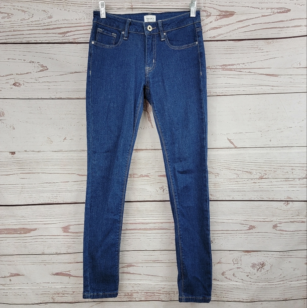 Special A dark wash mid rise skinny jeans